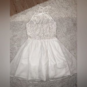 White dress with sequins.